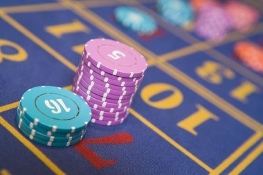 Live dealer table studio with professional croupiers
